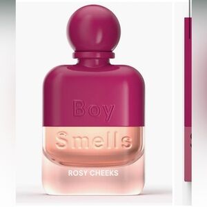 Boy smells rosy cheeks